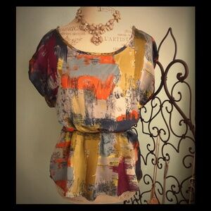 Silk multicolor blouse with orange ribbon waist tie